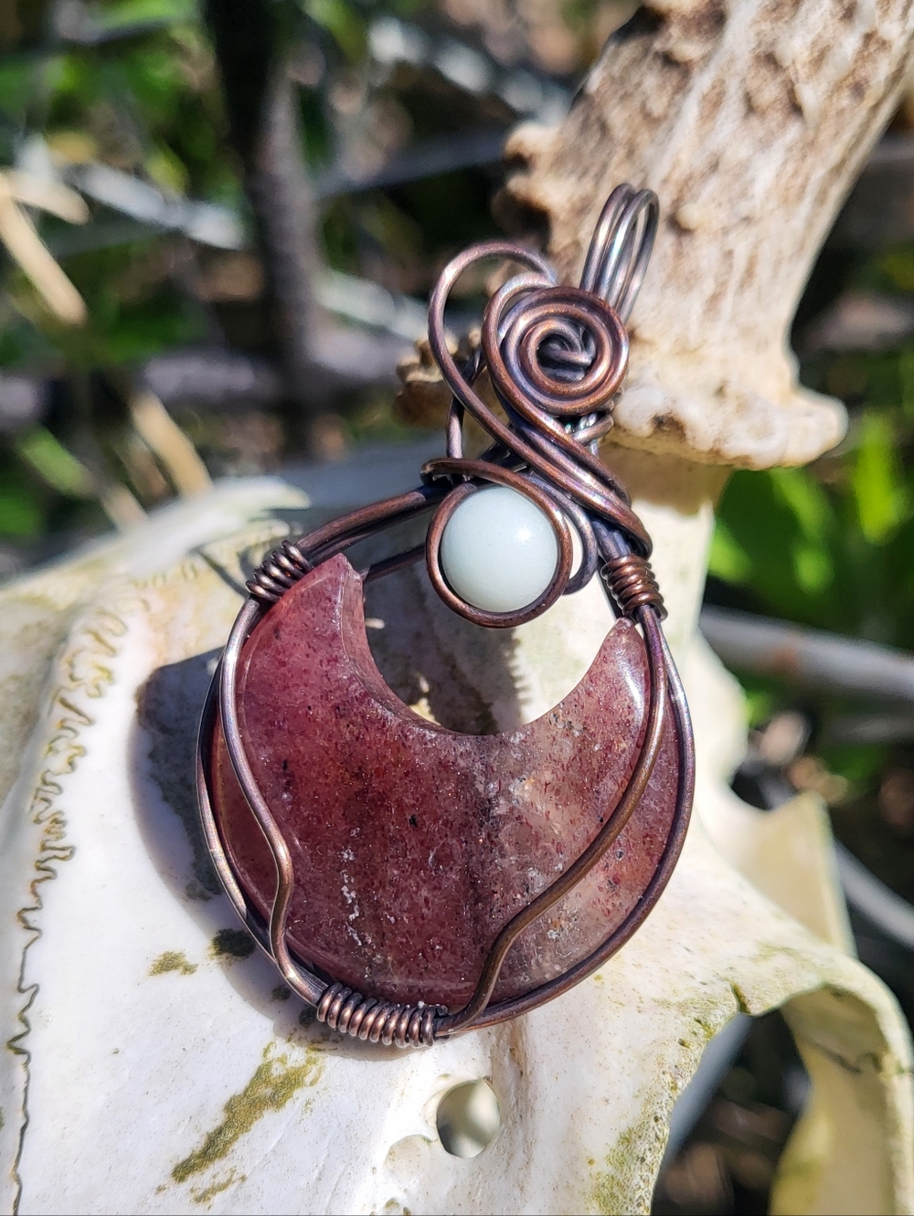 Strawberry Quartz Moon W/ Blue Glow Stone Pendant